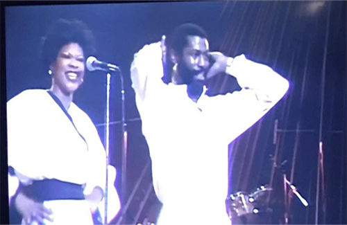 Sherry Wilson Butler on stage with Teddy Pendergrass